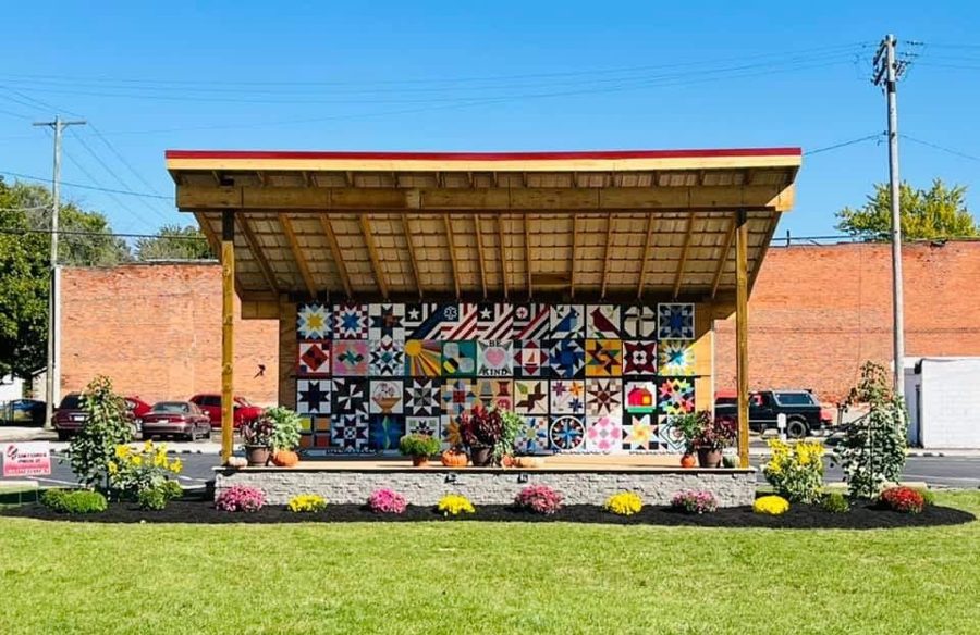 The wooden pavilion and mural wall at the UrbanWoody event space